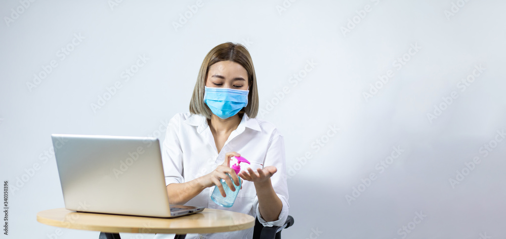Business woman Protec virus by Hand sanitizer prevent virus and plague infection. Corona Virus pandemic protection by washing hands frequently. Social Distancing. Hand cleaner alcohol 75%. Business woman Protec virus by Hand sanitizer prevent virus and plague infection. Corona Virus pandemic protection by washing hands frequently. Social Distancing. Hand cleaner alcohol 75%.