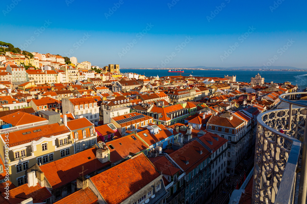Sunset panorama of historical Baixa District seen from Santa Justa Lift in city of Lisbon, Portugal