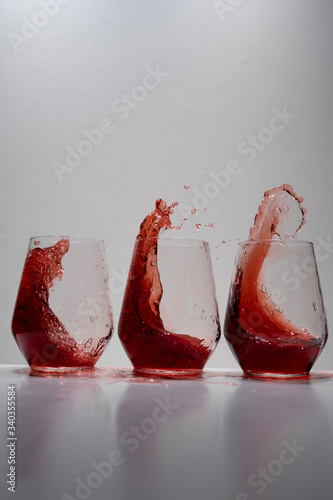 juice splash in a drinking glass photo