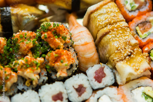 set of sushi and rolls. delicious japanese traditional food. Fish menu. assorted seafood