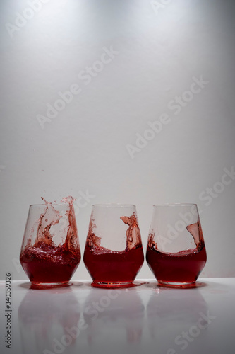 juice splash in a drinking glass photo