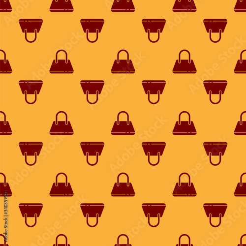 Red Handbag icon isolated seamless pattern on brown background. Female handbag sign. Glamour casual baggage symbol.  Vector Illustration