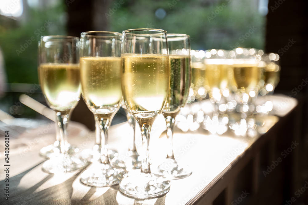 full glasses of champagne on the festive table