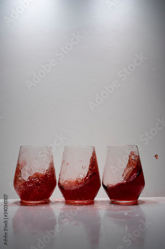 juice splash in a drinking glass photo