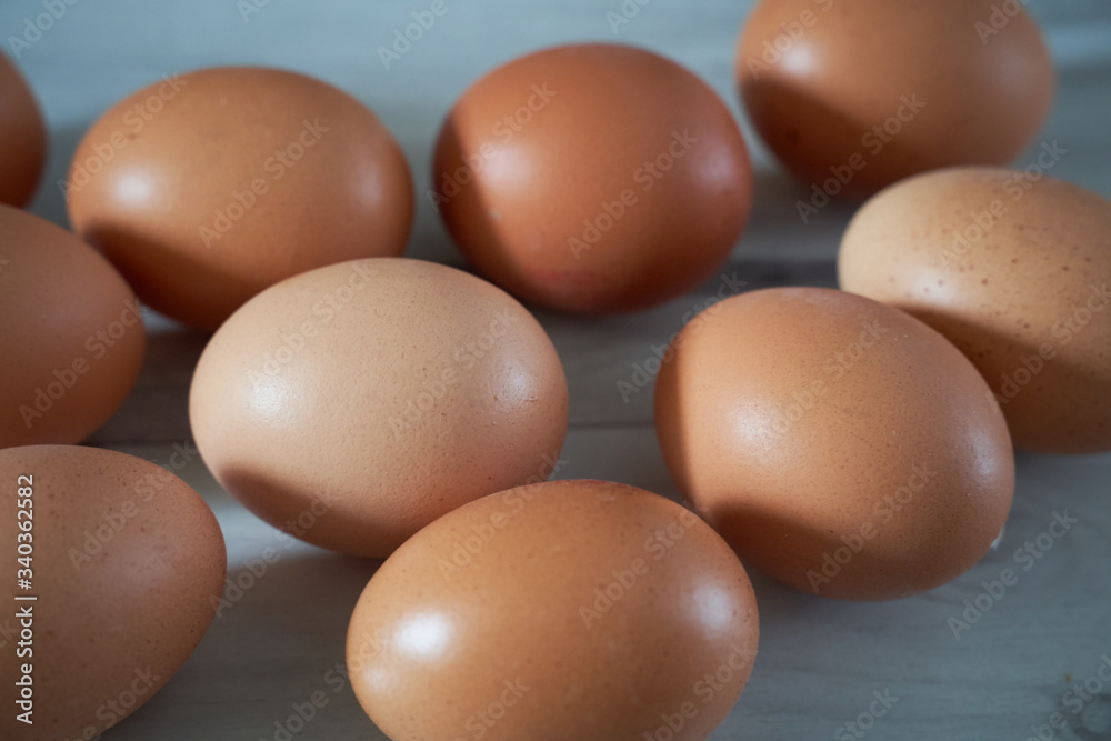 Organic eggs on a wooden background