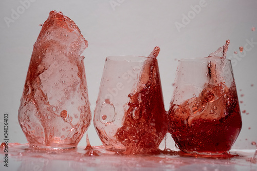 juice splash in a drinking glass photo