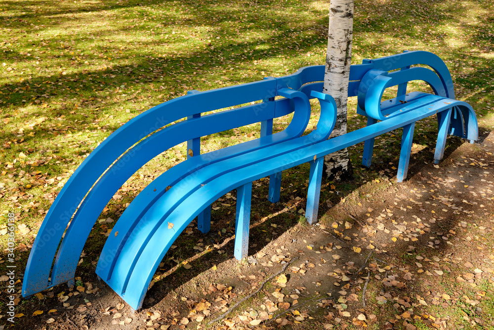 Funny, unusual blue benches in a park in Norway