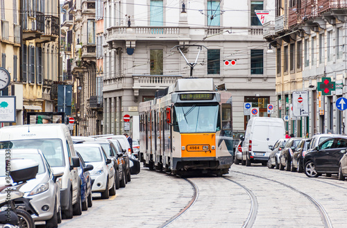 The daily life of the city of Milan. Trip tram goes along Cusani street in Milan, Italy.