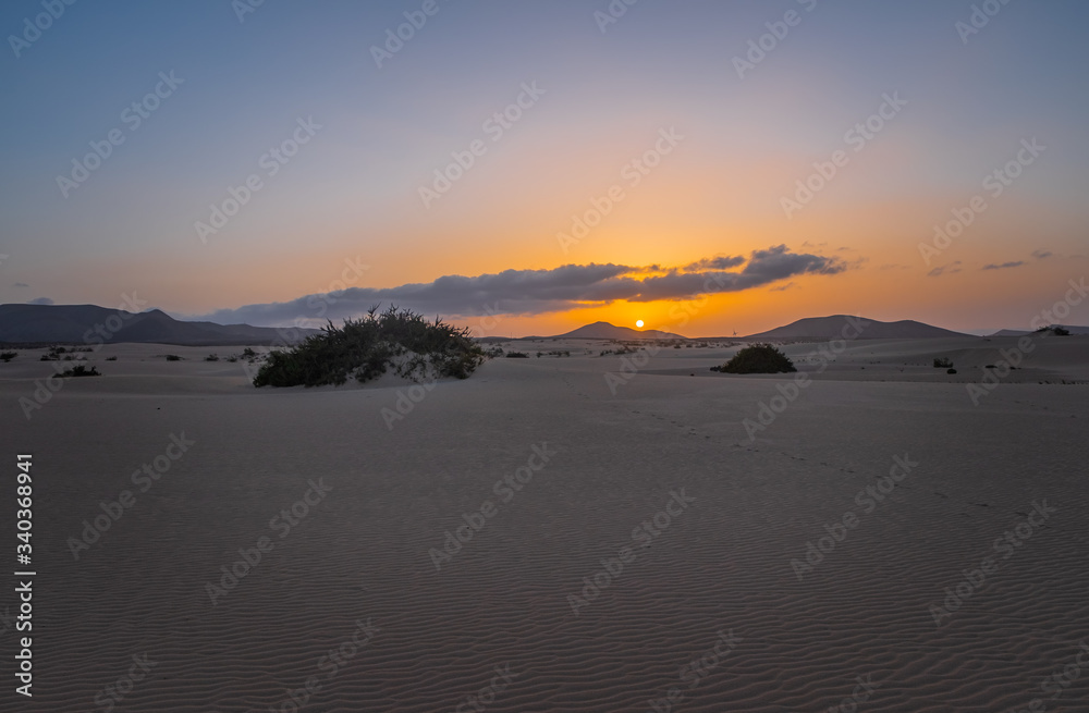 Sunset at the Dunes El Jable of National Park de Corralejo, Fuerteventura. October 2019