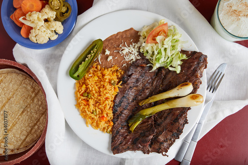 A classic Mexican dish of steak, rice and beans.