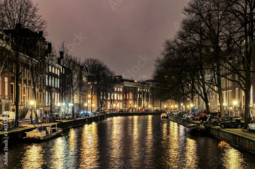 Photography Canals of Amsterdam in night illumination