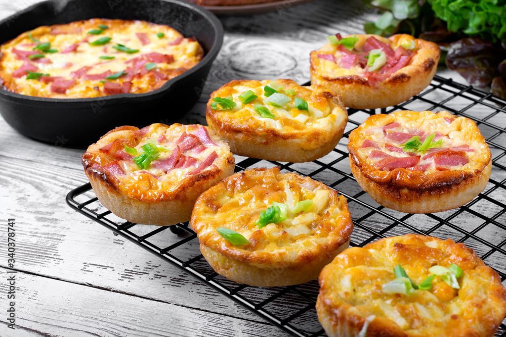 Belarusian pie, Smazhenka, with sausage, egg and topped with green onion Belarusian pie, Smazhenka, with sausage, egg and topped with green onion