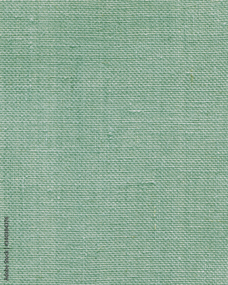 Blank, uncoated canvas or scrim for painting. Rough linen green or mint color cloth or burlap background and textured texture. Blank, uncoated canvas or scrim for painting. Rough linen green or mint color cloth or burlap background and textured texture.