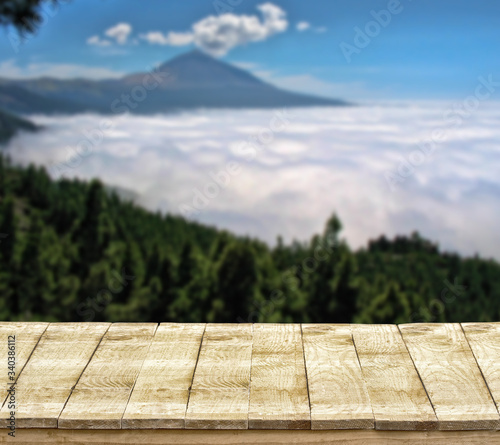 Beautiful nature background and volca with wooden floor photo