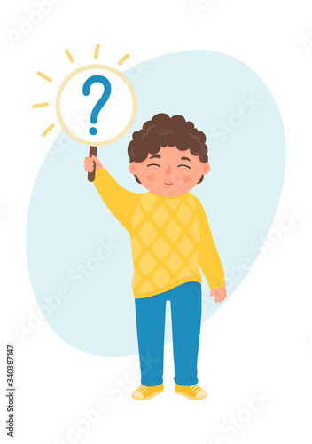 Cute little boy holding question mark. Kid asks question. Learning, knowledge, curiosity concept.