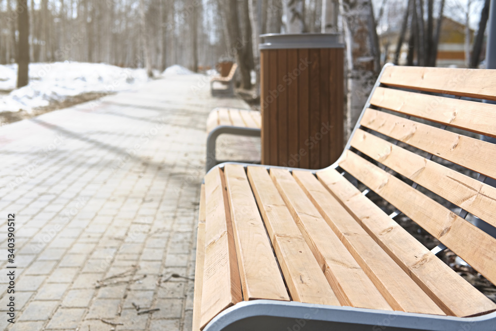 empty park during coronavirus pandemia. bench and walking road with no people. stay home for safe. covid-19 concept empty park during coronavirus pandemia. bench and walking road with no people. stay home for safe. covid-19 concept