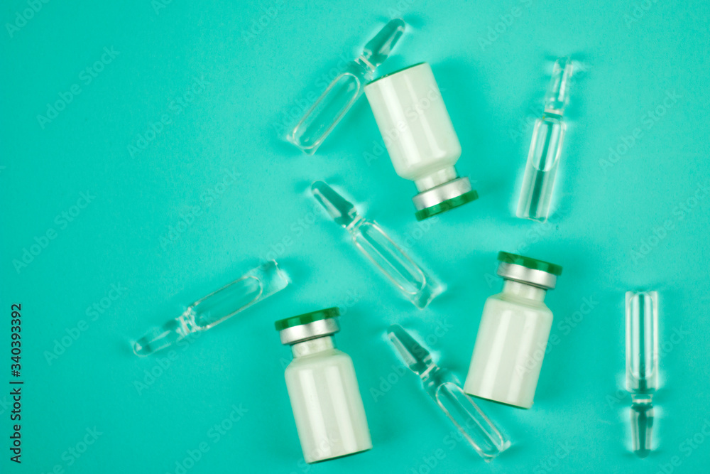 Naklejka premium medical instruments for vaccination against virus diseases in epidemics and pandemics, syringe with vaccine