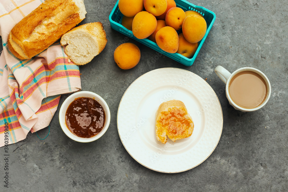 breakfast with apricot jam and slice of bread breakfast with apricot jam and slice of bread