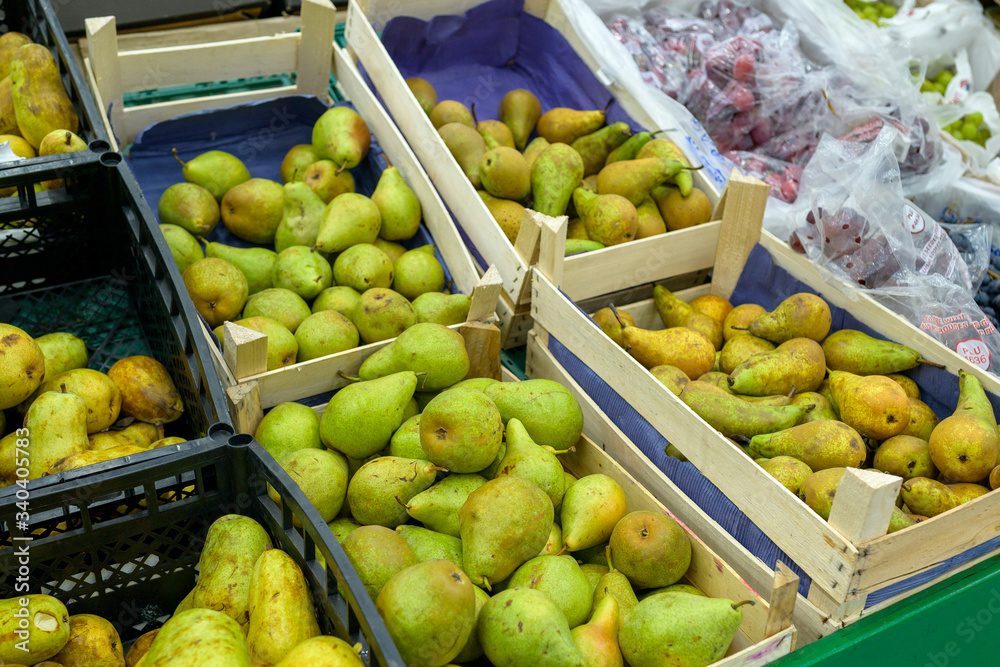 pears in boxes for sale in a supermarket