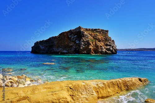 Halfa Island close to Gozo, Malta and Comino - one of the Maltese Archipelago - seen at the turquoise water of Mideterranean Sea