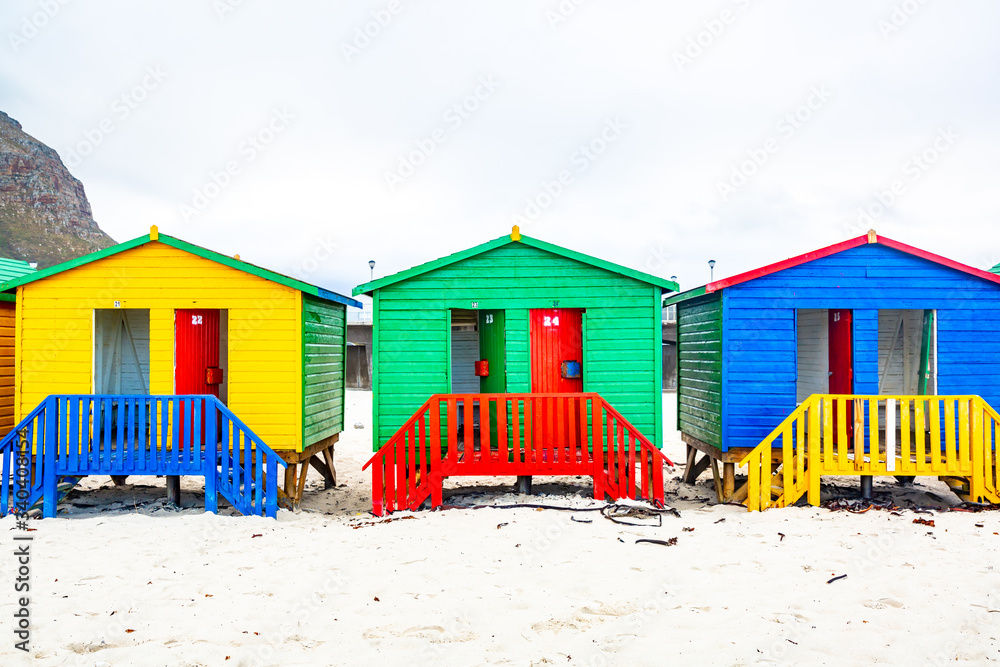 Naklejka premium colorful huts of Muizenberg beach near Cape Town in South Africa