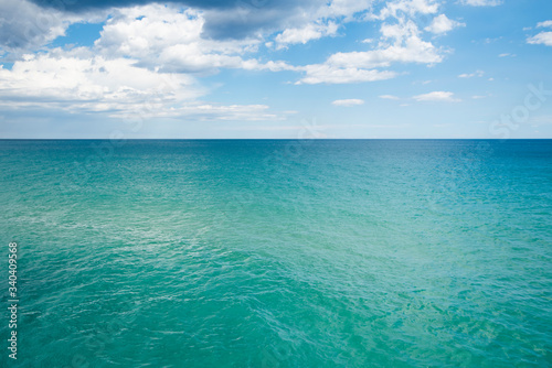 Fototapeta Naklejka Na Ścianę i Meble -  scenery view of transparent water and blue sky with horizont line