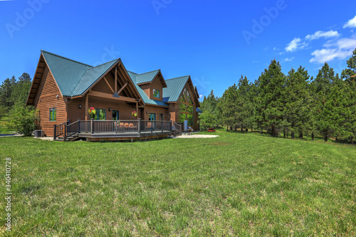 Amazing beautiful mountain home in Cascade Mountains in USA with green lavish maountains, cedar large home. photo