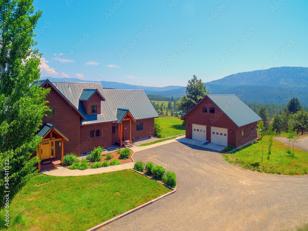 Amazing beautiful mountain home in Cascade Mountains in USA with green lavish maountains, cedar large home.