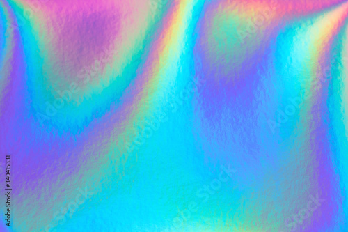 Retro holographic foil background  great design for any purposes. Abstract colorful vibrant blur iridescent gradient. Retro futuristic label design.