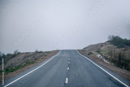 Road to nowhere in the fog. The roads of the Kola Peninsula.