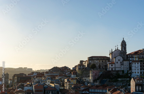 View to the historical part of the city of Porto. Sunset and sky with clouds.