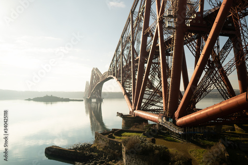Bild auf Leinwand Unique Forth Bridge, a UNESCO World Heritage Site, carries the rail tracks from South to North Queensferry, Edinburgh