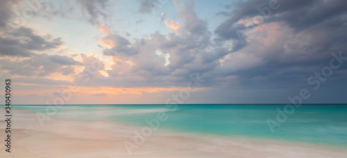 tropical paradise beach with white sand and coco palms travel tourism wide panorama background Luxury travel summer holiday background concept.