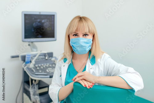 Gynecologist in a protective mask