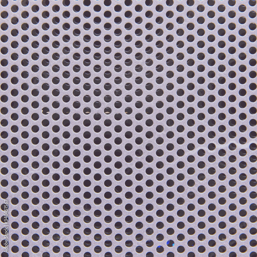 Metal grid background with round holes, grey texture