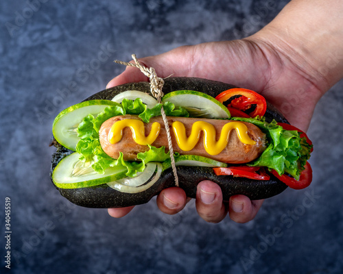 Traditional Delicious Hot Dog with Black Bread