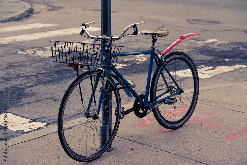 Bike locked to sign post Bike locked to sign post