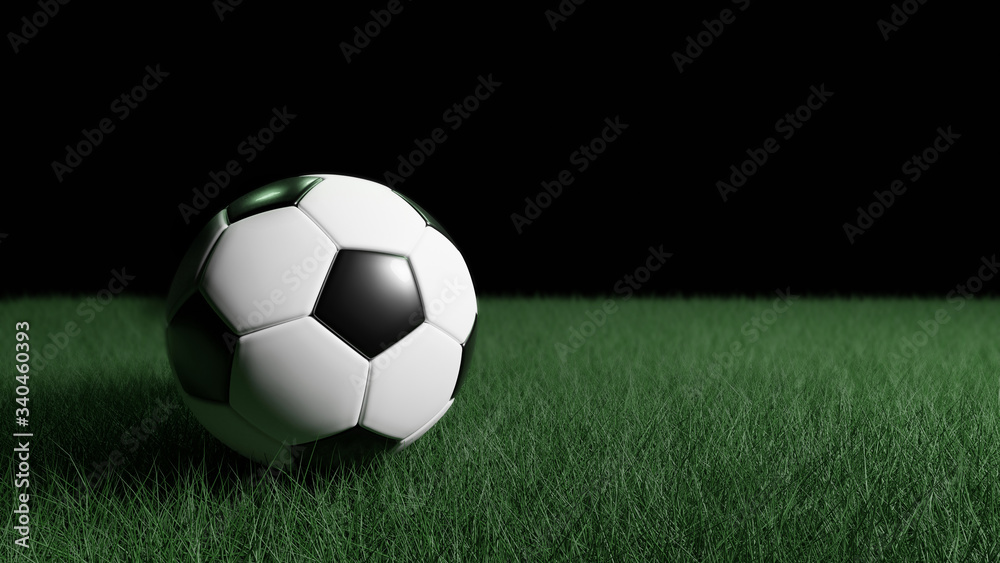 Classic soccer ball on the green field with a black background.3d rendering. Classic soccer ball on the green field with a black background.3d rendering.