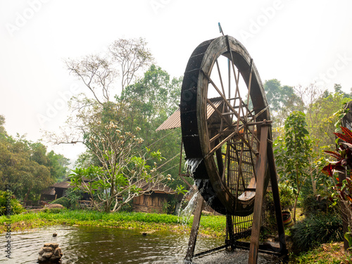 Turbine wooden Rotating water at Chae Son National Park, a national park in Mueang Pan district  Lampang, Thailand