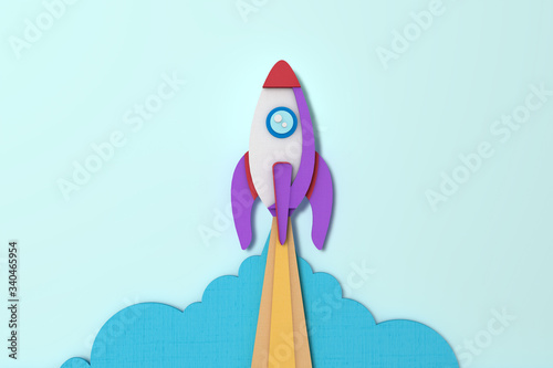 Paper craft rocket startup business launch.