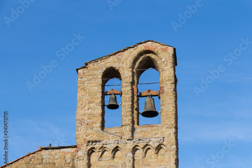 Fotobehang Bell tower of the Basilica of San Domenico in a sunny day, Arezzo, Tuscany, Italy