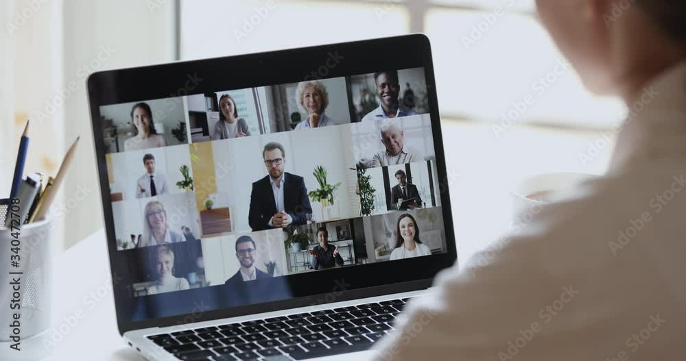 Business woman remote worker video conferencing boss and colleagues by online call, employees team chat working from home office. Group videocall discussion concept. Over shoulder laptop screen view