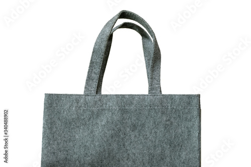 Shopping bag made with felt fabric or cloth isolated against white background. Cloth carry bag to replace plastic bags for environment protection.