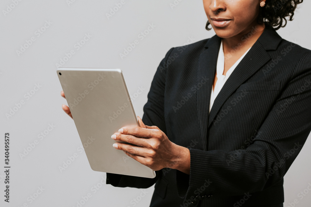 Professional woman holding a digital tablet Professional woman holding a digital tablet
