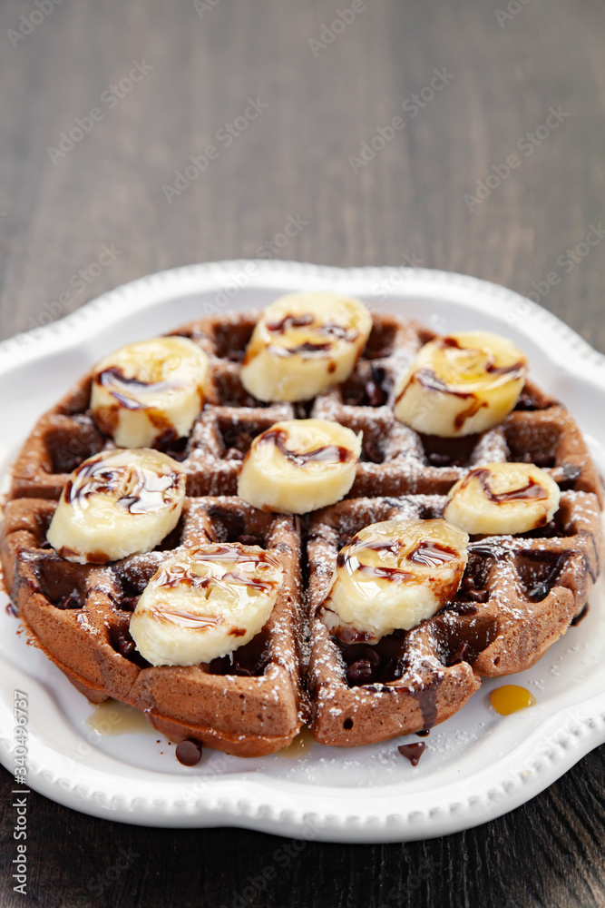 Chocolate banana waffle with caramel sauce