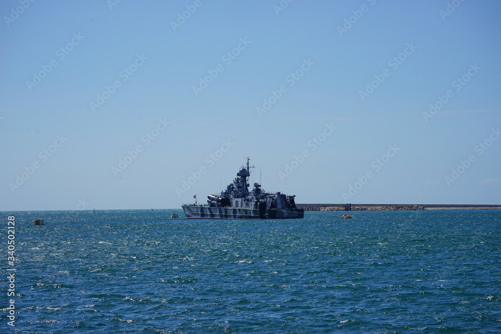 A warship on the background of the seascape