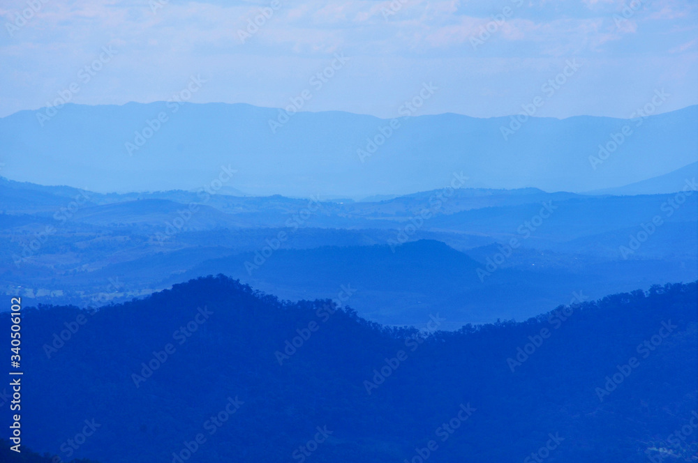 Naklejka premium mountain landscape with clouds