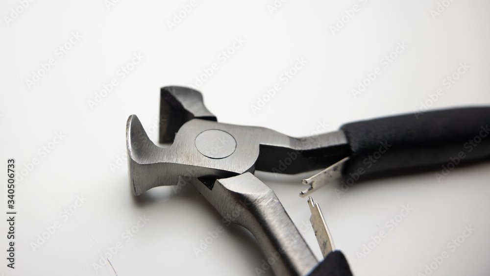 End nipper pliers, close up on white background. End nipper pliers, close up on white background.