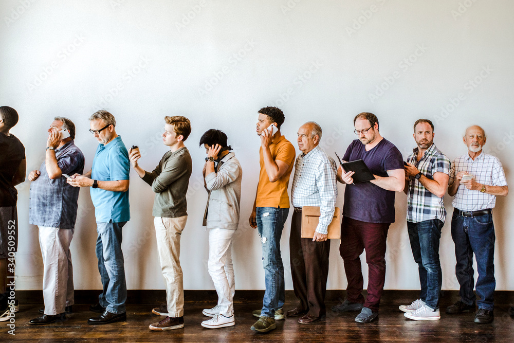 People waiting in a line for a job interview