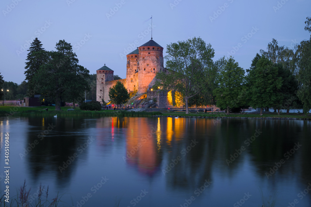 The ancient fortress of the Savonlinna city on a July twilight. Finland